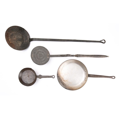 81 - An iron long-handled frying pan: with 20cm diameter bowl, an iron lidded circular cooking pan with t... 