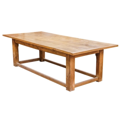 85A - An oak refectory dining table: of large size, the rectangular cleated plank top on square chamfered ... 