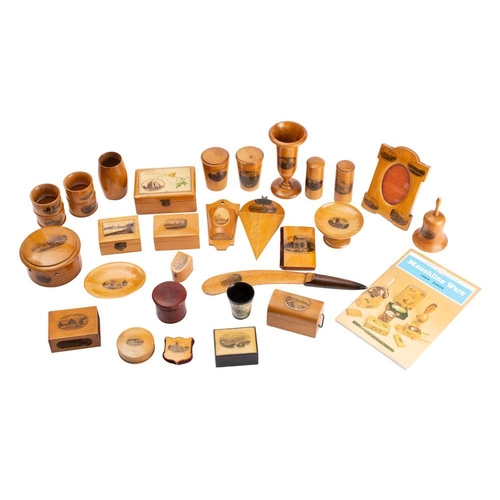 557 - A collection of approx thirty assorted pieces of Mauchline wares, includes napkin rings, matchbox ho... 