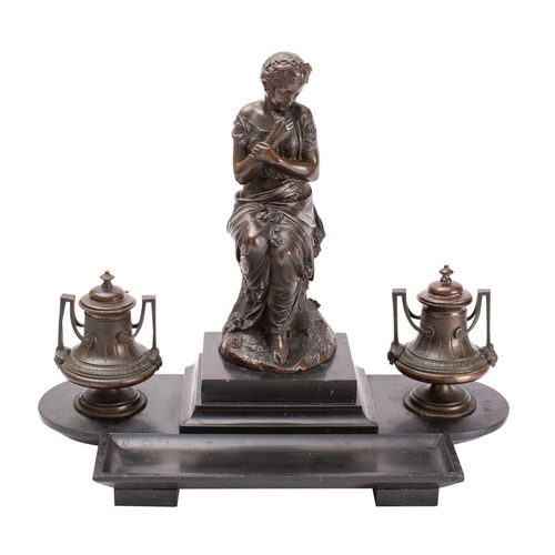 568 - A Salmson bronze desk stand the central figure of a robed female holding a bird to her breast, signe... 