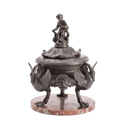 569 - A 19th century bronze vase and cover, the foliate decorated domed top surmounted by a seated putto, ... 