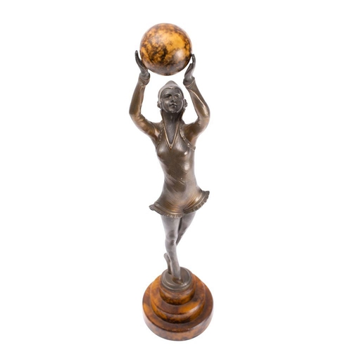 578 - An Art Deco style bronzed metal figure of a young woman holding a ball above her head, mounted on a ... 