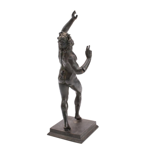 581 - After the Antique, a bronzed spelter figure 'The Dancing Faun of Pompeii'  mounted on a square base,... 