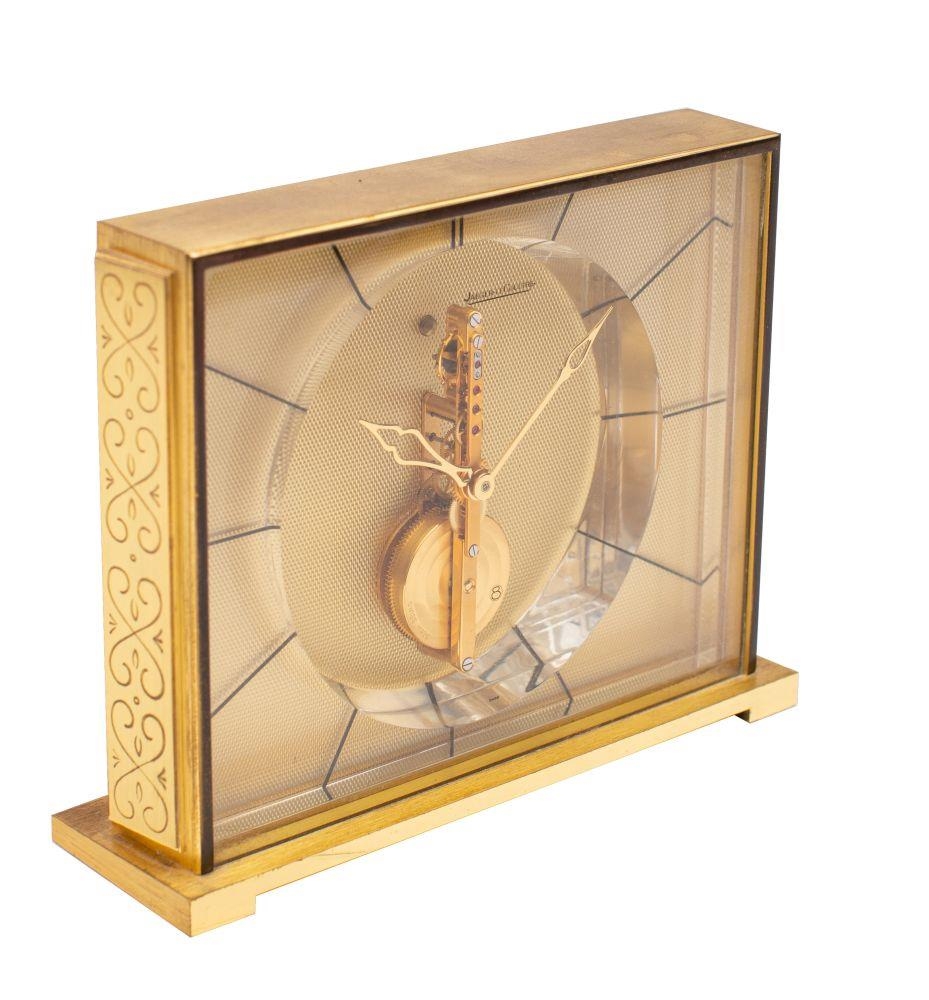 Jaeger LeCoultre a gilt brass and lucite Baguette desk clock