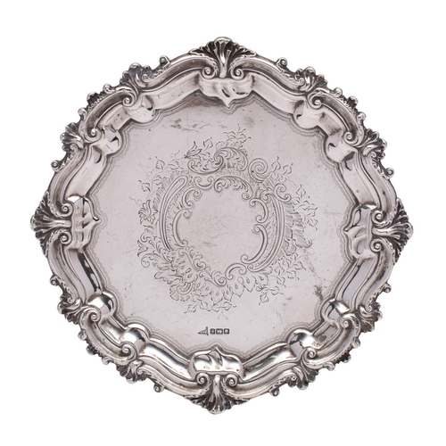 2074 - A George V silver waiter, maker Walker & Hall, Sheffield, 1910 of circular outline with scroll and f... 