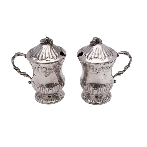 2127 - A pair of Continental silver lidded mustard pots, bears import marks for London, 1922 of cylindrical... 