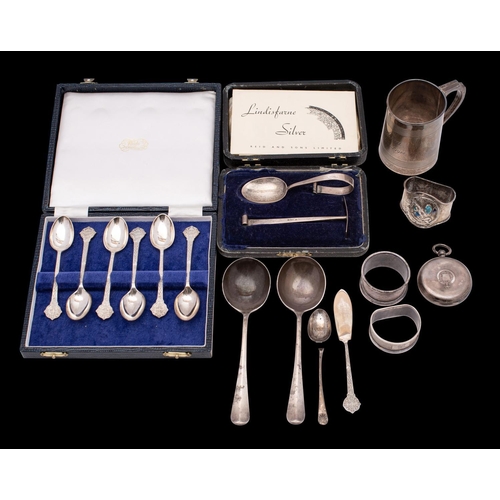 2195 - A mixed collection of assorted silverwares, various makers and dates includes a christening mug, thr... 