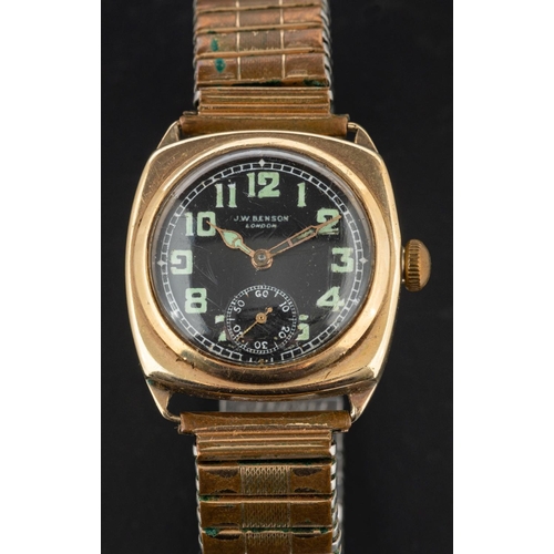 2342 - JW Benson, a 1930's  wristwatch, the black enamel military dial with fluorescent Arabic numerals and... 