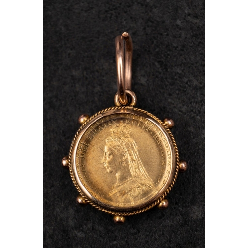 2386A - A Victorian three pence coin, dated 1887, the Jubilee year, diameter ca. 16mms, mounted as a pendant... 