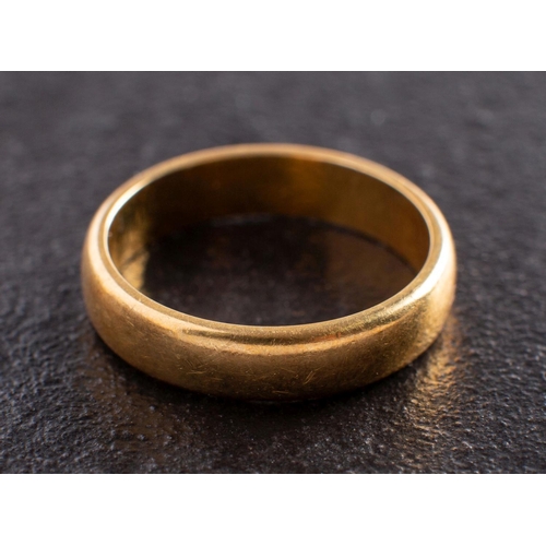 2403 - An 18ct gold band ring, with hallmarks for London, 1969, ring size J, total weight ca. 3.5gms.