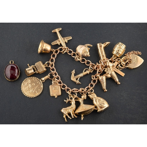 2430 - A 9ct gold, curb-link charm bracelet with heart-shaped clasp, with hallmarks for 1987, the majority ... 