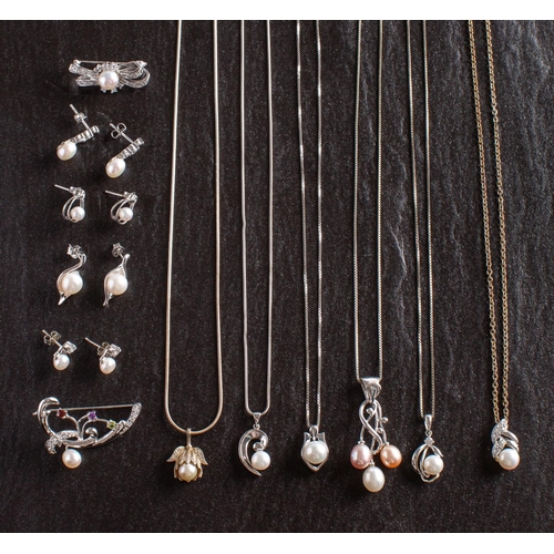 2469A - A collection of 'Cornwall Pearl' jewellery, including six pendants, two brooches and four pairs of e... 