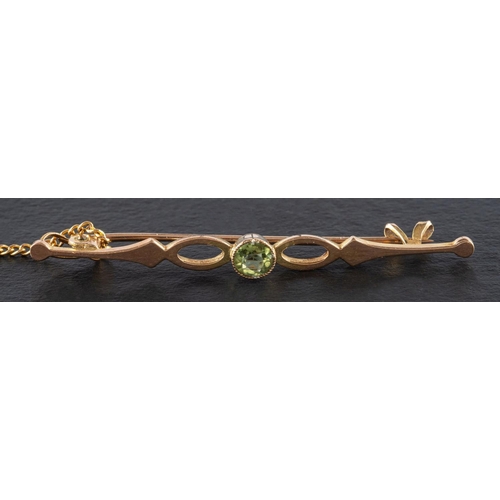 2485 - Two gemset brooches, including a peridot bar brooch, stamped '9CT', weight ca. 2.5gms, accompanied b... 