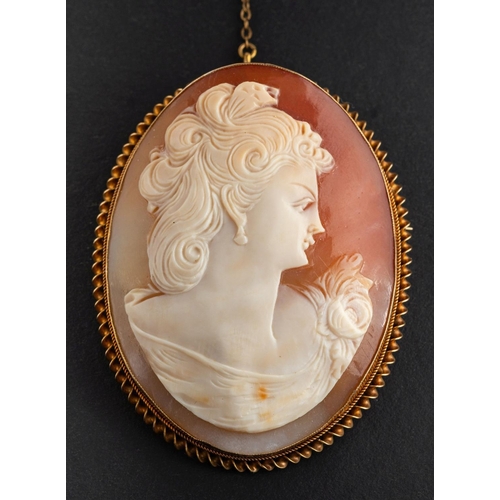 2486 - A 9ct gold, carved shell cameo brooch, depicting the bus of a lady in profile, with hallmarks for Bi... 