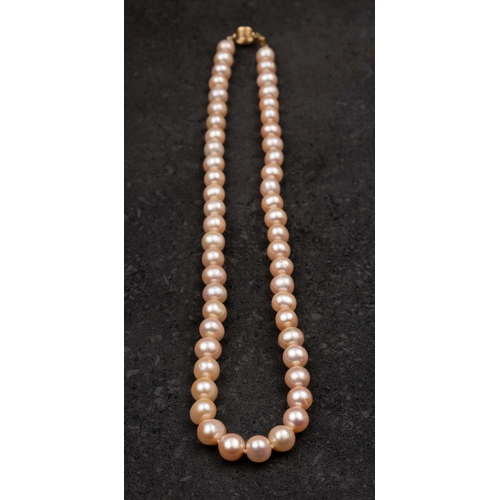 2524A - A cultured pearl necklace, the cultured pearls of off-round form and pink hue with yellowish overton... 