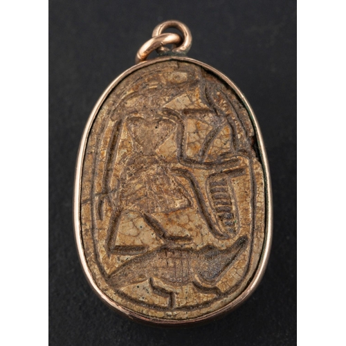 2557 - A late 19th century/ early 20th century faience scarab pendant, length ca. 2.5cm. total weight ca. 8... 