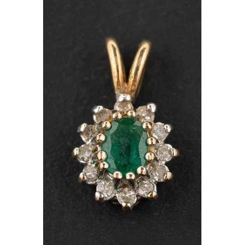 2771 - An oval, mixed-cut emerald and single-cut diamond cluster pendant, estimated emerald weight ca. 0.25... 