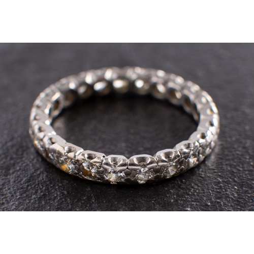 2967 - A round, brilliant-cut diamond, full-eternity ring, total estimated diamond weight ca. 0.90ct, ring ... 