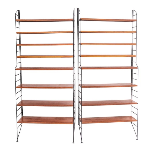 329 - A pair of teak and metal mounted floor standing shelving units, almost certainly Robert Heal, Ladder... 