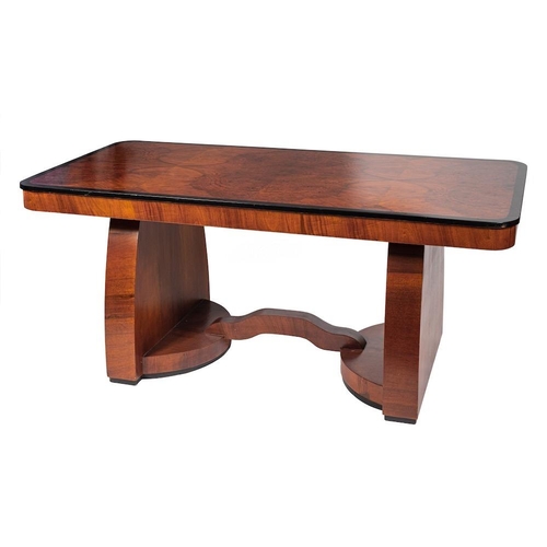 331A - WITHDRAWN LOT    An Art Deco walnut and ebonised dining table, circa 1930,: the rectangular top with... 