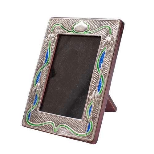 334 - A sterling silver and enamel photo frame, stamped Sterling in the Art Nouveau taste, of rectangular ... 