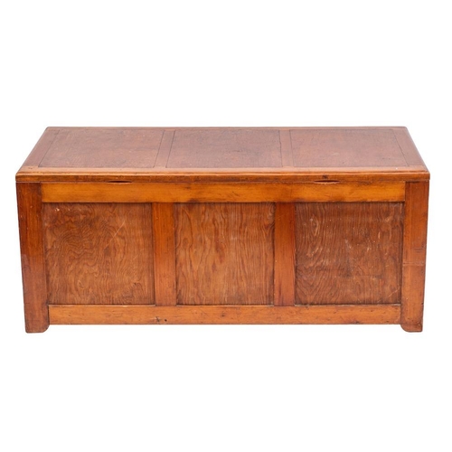 105 - A pitch pine trunk, mid 20th century; the three panel hinged top above a conforming front, with twin... 