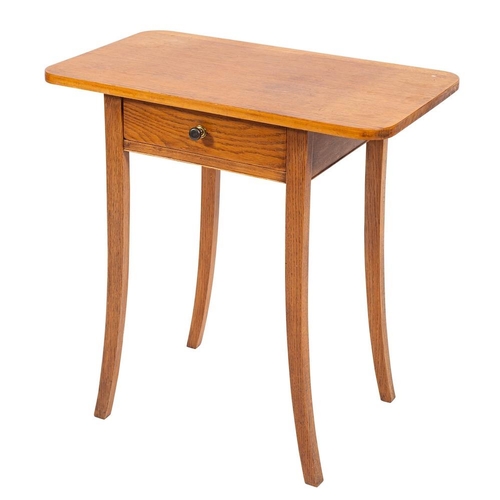 108 - Utility Furniture Scheme, an oak side table, the rectangular top with rounded corners, above a friez... 