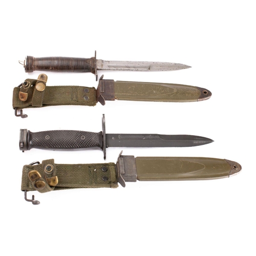 214 - Two US M4 pattern fighting knives, one with rectangular hilt and wooden grip, the other with blacken... 