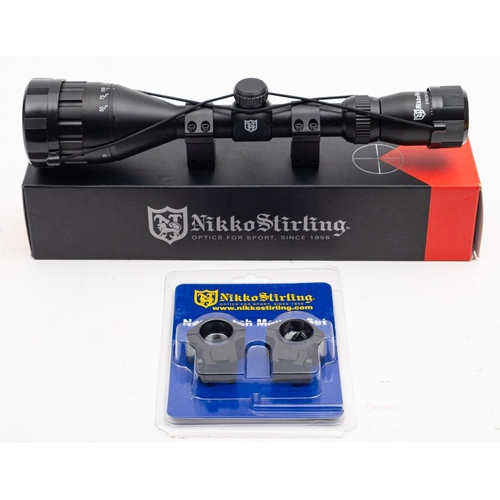 85 - A Nikko Sterling  3-9x50 AO  Mountmaster scope,  together with a set of Nikko Sterling New Match Mou... 