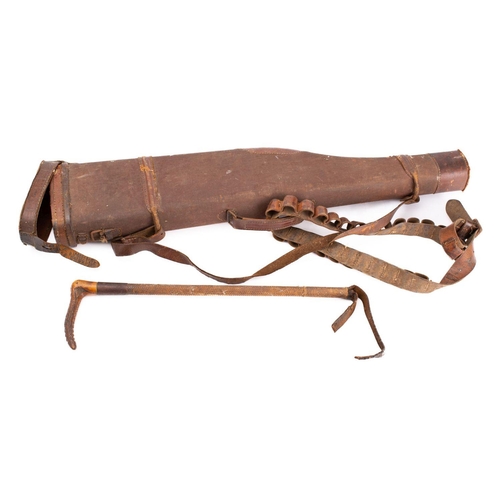 91 - An early 20th century canvas and leather leg-o-mutton gun case,  together with a leather cartridge b... 