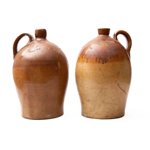 14 - A pair of stoneware two gallon wine jars for 'Evans Wine & Spirit Merchant Newton (Bushell)' (2)