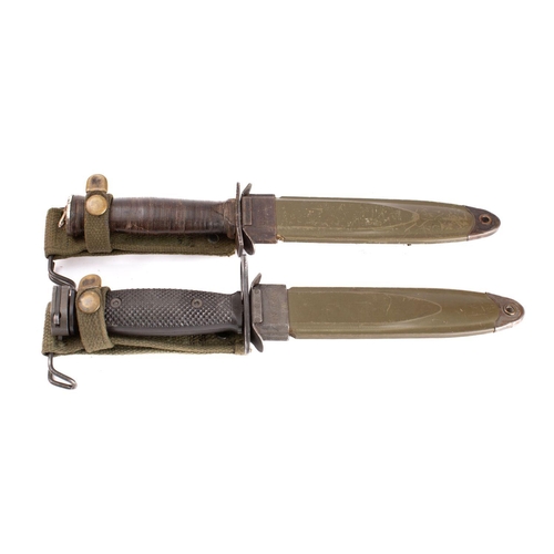 214 - Two US M4 pattern fighting knives, one with rectangular hilt and wooden grip, the other with blacken... 