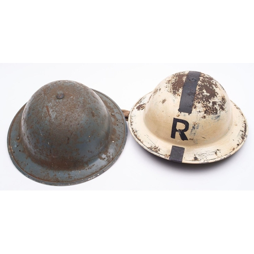 248 - A WWII Mk I steel  'Rescue' helmet white with  black stripe and 'R' , together with a Mk III steel h... 