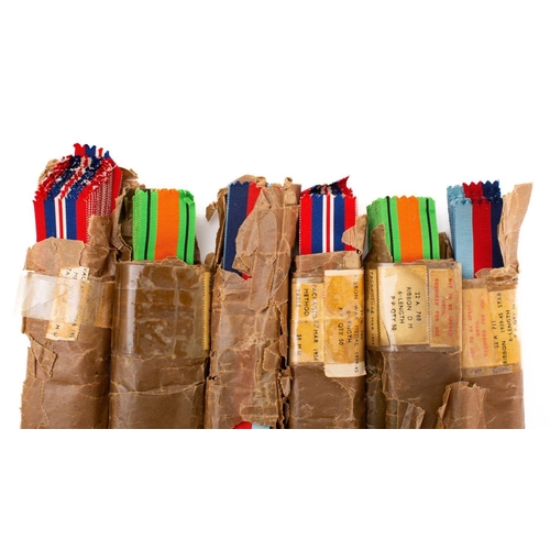 259 - A group of six packets of British Campaign Medal ribbons, including 1939-45 War Medal in remains of ... 