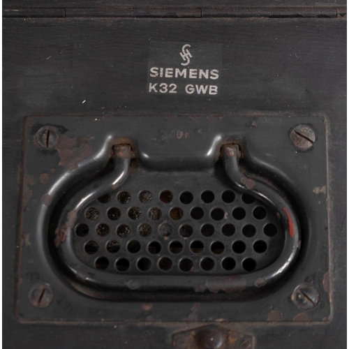 358 - A WWII Luftwaffen-Koffer K32GWB Radio by Siemens, circa 1942,  the wooden case with metal mounted co... 