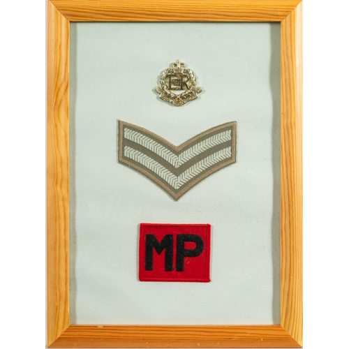 383 - A collection of British Regimental Greeting cards and a framed group of MP insignia.