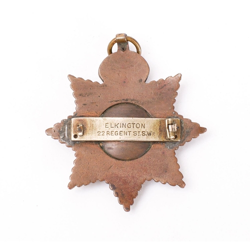 386 - An Edward VII Imperial Service Order with pin mount to back stamped Elkington (poor condition)

**Pl... 