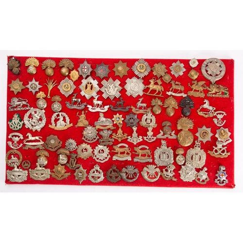 416 - A collection of British Regimental cap badges: including  The Royal Sussex Regiment, Cornwall Light ... 