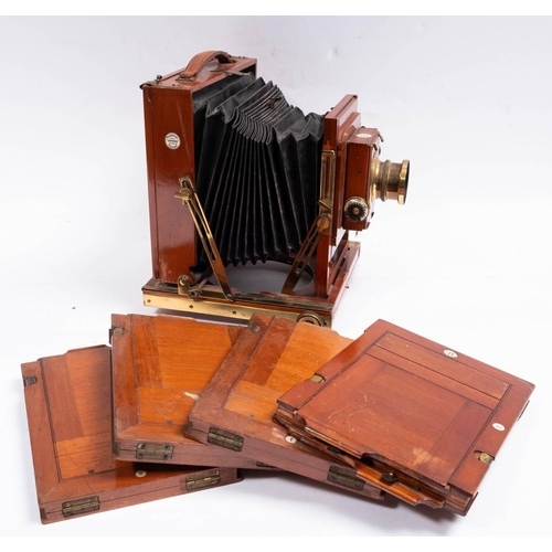 555 - A Thornton Packard 'Triple Imperial' mahogany and brass three quarter plate camera,  fitted Thornton... 