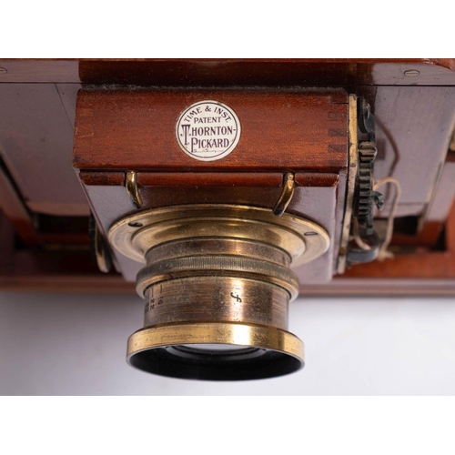 555 - A Thornton Packard 'Triple Imperial' mahogany and brass three quarter plate camera,  fitted Thornton... 