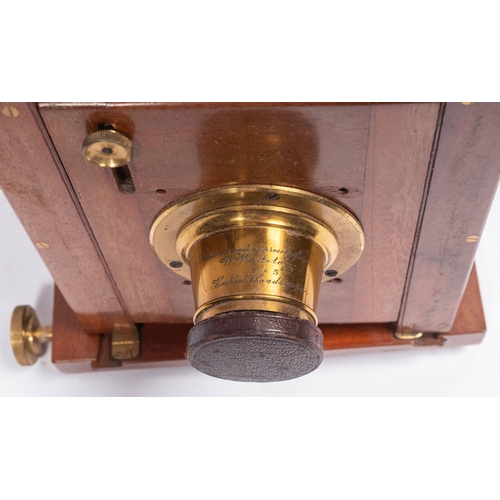 556 - A Perkin Son & Rayment  mahogany and brass half plate field camera,  fitted lens engraved 'Made Abro... 