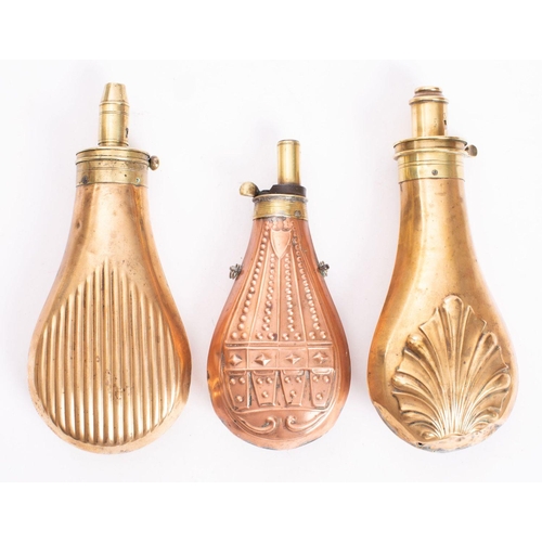 77 - Three copper and brass powder flasks, unsigned (3)