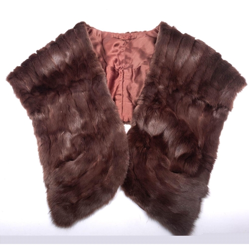 819 - A mid 20th century mink fur coat: size 14 label to nape, together with a fur stole (2)