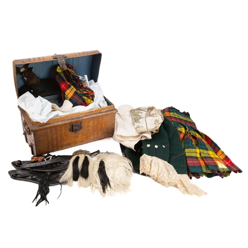 820 - An early 20th century boy's highland costume, comprising glengarry, green Prince Charlie jacket with... 