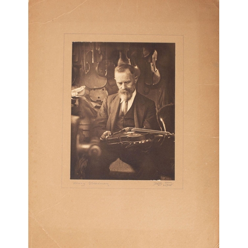 1068 - An early 20th century photograph of Exeter Violin maker Henry Stoneman by Donald R Baker, 1925, insc... 