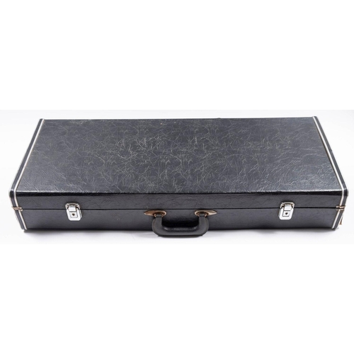 1069 - A Melody Maker brass and nickel plated tenor saxophone in  fitted case.