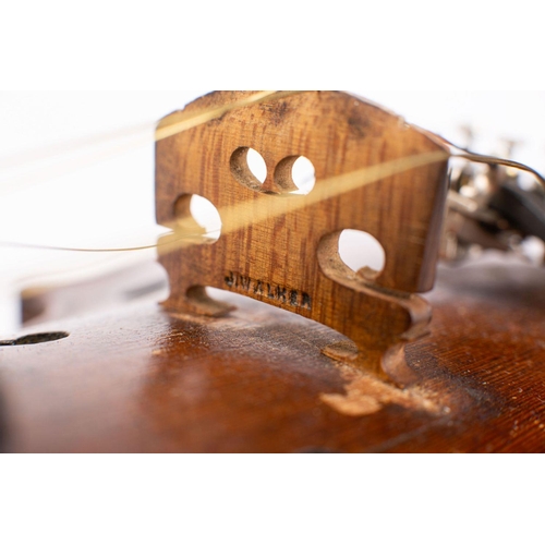 1071 - An early 20th century American violin stamped 'RR' to button, scroll carved headstock with ebony key... 