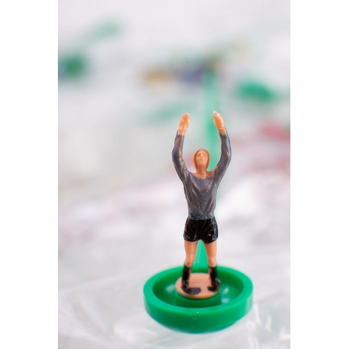 1078 - A collection of loose Subbuteo figures  in sixteen different strips including, Brazil, Germany and I... 