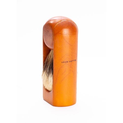 1210 - A Louis Vuitton travel shaving brush,  the badger hair brush on a rotating resin  handle.