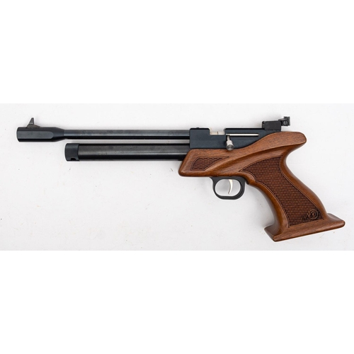 143 - An SMK CP-1 .22 calibre CO2 target air pistol, bolt action chamber, black finish and chequered walnu... 